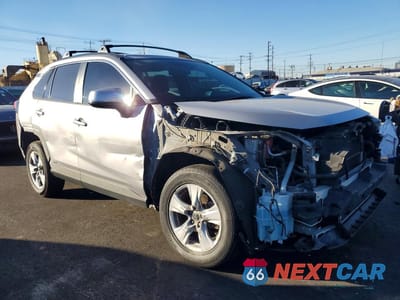 Czwarte zdjęcie samochodu z boku: 2019 TOYOTA RAV4 HYBRID LE VIN:JTMMWRFV1KD518041 - miniatura
