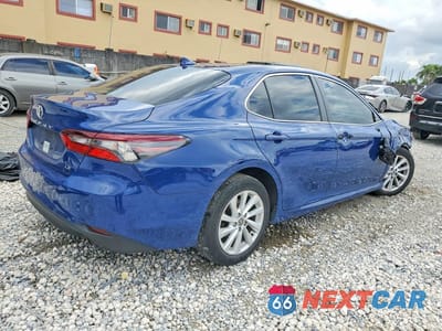 Trzecie zdjęcie samochodu z tyłu: 2023 TOYOTA CAMRY LE VIN:4T1C11AK8PU178186 - miniatura