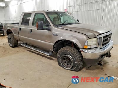 Czwarte zdjęcie samochodu z boku: 2004 FORD F250 SUPER DUTY VIN:1FTNW21P64EA55427 - miniatura
