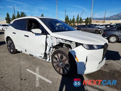Czwarte zdjęcie samochodu z boku: 2026 BMW IX XDRIVE45 VIN:WB543CF04TCV02588 - miniatura