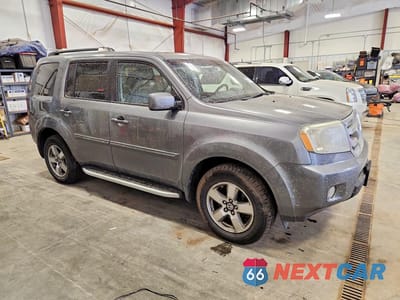 Czwarte zdjęcie samochodu z boku: 2009 HONDA PILOT EXL VIN:5FNYF48699B031666 - miniatura