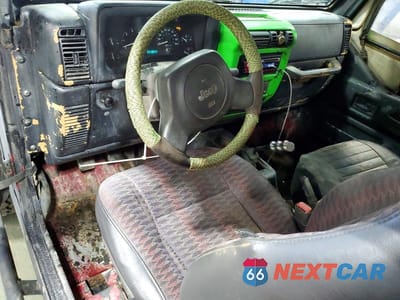 Zdjęcie 8 z 12 samochodu: 1998 JEEP WRANGLER / TJ SE VIN:1J4FY29P9WP710149 - miniatura