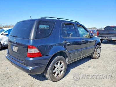 Trzecie zdjęcie samochodu z tyłu: 2001 MERCEDES-BENZ ML 430 VIN:4JGAB72E91A230076 - miniatura