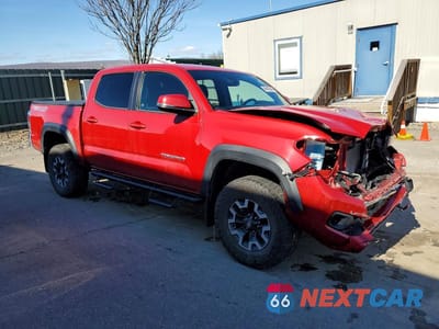 Czwarte zdjęcie samochodu z boku: 2023 TOYOTA TACOMA TRD OFF-ROAD VIN:3TMCZ5AN8PM584245 - miniatura