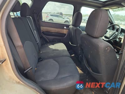 Zdjęcie 11 z 13 samochodu: 2010 MERCURY MARINER VIN:4M2CN8B71AKJ07128 - miniatura