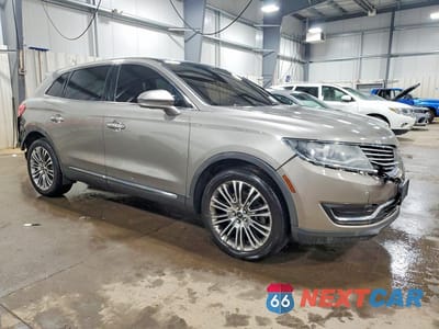 Czwarte zdjęcie samochodu z boku: 2016 LINCOLN MKX RESERVE VIN:2LMTJ8LR6GBL51717 - miniatura