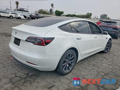 Trzecie zdjęcie samochodu z tyłu: 2022 TESLA MODEL 3 VIN:5YJ3E1EA6NF109819 - miniatura