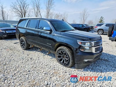 Czwarte zdjęcie samochodu z boku: 2015 CHEVROLET TAHOE K1500 LTZ VIN:1GNSKCKC7FR552800 - miniatura