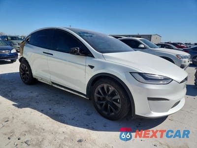 Czwarte zdjęcie samochodu z boku: 2022 TESLA MODEL X VIN:7SAXCAE5XNF357312 - miniatura