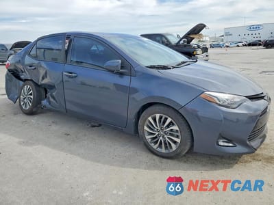 Czwarte zdjęcie samochodu z boku: 2018 TOYOTA COROLLA XLE VIN:5YFBURHE2JP759225 - miniatura