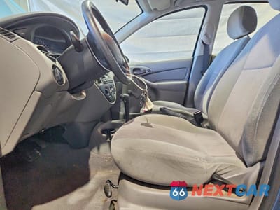 Zdjęcie 7 z 12 samochodu: 2000 FORD FOCUS SE VIN:1FAFP34P6YW205609 - miniatura