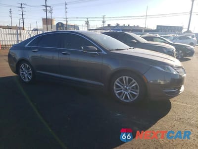 Czwarte zdjęcie samochodu z boku: 2015 LINCOLN MKZ HYBRID VIN:3LN6L2LU5FR603140 - miniatura