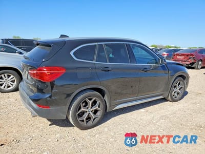 Trzecie zdjęcie samochodu z tyłu: 2018 BMW X1 SDRIVE28I VIN:WBXHU7C31J5L06699 - miniatura