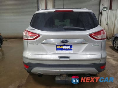 Zdjęcie 6 z 11 samochodu: 2014 FORD ESCAPE TITANIUM VIN:1FMCU0J90EUC91805 - miniatura