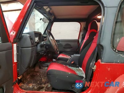 Zdjęcie 7 z 14 samochodu: 2003 JEEP WRANGLER COMMANDO VIN:1J4FA39S63P360778 - miniatura