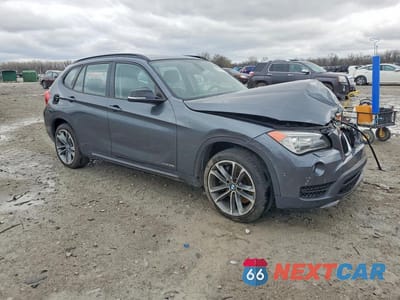 Czwarte zdjęcie samochodu z boku: 2015 BMW X1 XDRIVE35I VIN:WBAVM5C50FVV94872 - miniatura