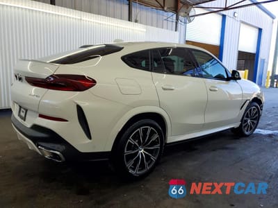 Trzecie zdjęcie samochodu z tyłu: 2026 BMW X6 XDRIVE40I VIN:5UX33EX02T9135471 - miniatura