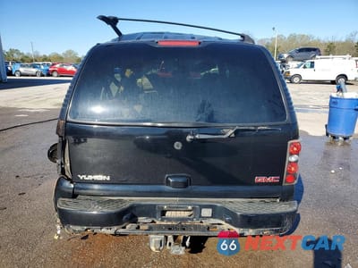 Zdjęcie 6 z 13 samochodu: 2003 GMC YUKON DENALI VIN:1GKEK63U93J289318 - miniatura