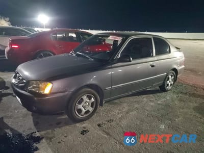 2002 HYUNDAI ACCENT KMHCG35C12U213978 - główne zdjęcie licytacji z USA - miniatura