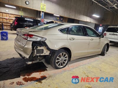 Trzecie zdjęcie samochodu z tyłu: 2017 FORD FUSION SE HYBRID VIN:3FA6P0LUXHR171912 - miniatura