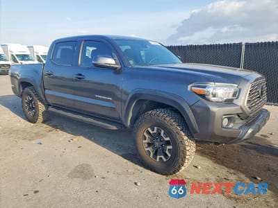 Czwarte zdjęcie samochodu z boku: 2022 TOYOTA TACOMA TRD OFF-ROAD VIN:3TMCZ5ANXNM499775 - miniatura