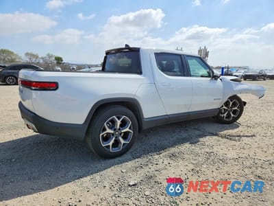 Trzecie zdjęcie samochodu z tyłu: 2024 RIVIAN R1T ADVENTURE VIN:7FCTGBAA3RN033290 - miniatura