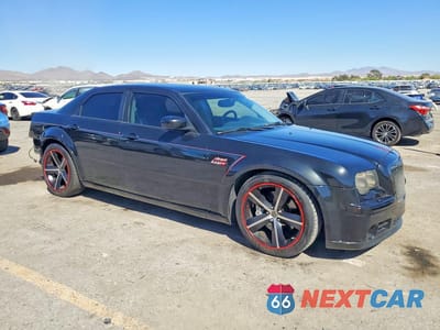 Czwarte zdjęcie samochodu z boku: 2006 CHRYSLER 300C SRT-8 VIN:2C3LA73W06H330071 - miniatura