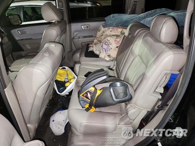 Zdjęcie 10 z 14 samochodu: 2011 HONDA PILOT VIN:5FNYF3H51BB022189 - miniatura