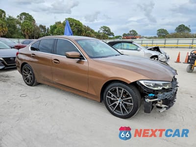 Czwarte zdjęcie samochodu z boku: 2019 BMW 330I VIN:WBA5R1C53KAK07520 - miniatura