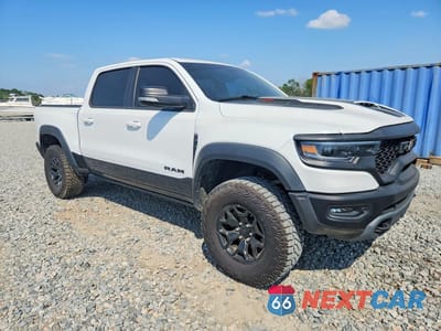 Czwarte zdjęcie samochodu z boku: 2022 RAM 1500 TRX VIN:1C6SRFU91NN260080 - miniatura