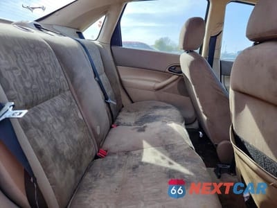 Zdjęcie 10 z 13 samochodu: 2005 FORD FOCUS ZX4 VIN:1FAFP34N25W229335 - miniatura