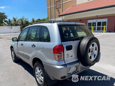 Trzecie zdjęcie samochodu z tyłu: 2003 TOYOTA RAV4 BASE VIN:JTEGH20V930118398 - miniatura