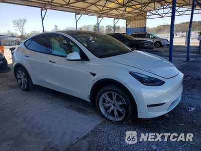 Czwarte zdjęcie samochodu z boku: 2022 TESLA MODEL Y VIN:7SAYGDEE7NF537535 - miniatura