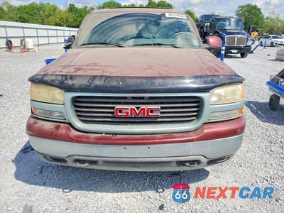 Piąte zdjęcie samochodu w środku: 2001 GMC YUKON VIN:1GKEC13T21J252292 - miniatura