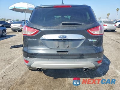 Zdjęcie 6 z 13 samochodu: 2014 FORD ESCAPE TITANIUM VIN:1FMCU0J90EUA07704 - miniatura