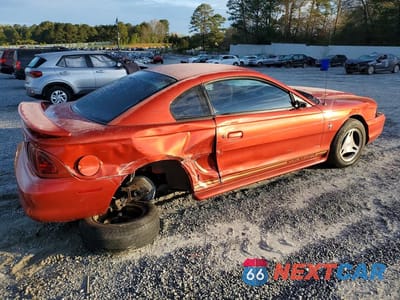 Trzecie zdjęcie samochodu z tyłu: 1997 FORD MUSTANG VIN:1FALP4046VF193591 - miniatura