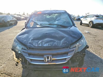 Piąte zdjęcie samochodu w środku: 2012 HONDA CR-V LX VIN:2HKRM3H37CH505357 - miniatura