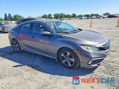 Czwarte zdjęcie samochodu z boku: 2019 HONDA CIVIC LX VIN:19XFC2F65KE208412 - miniatura