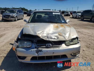 Piąte zdjęcie samochodu w środku: 2002 TOYOTA COROLLA S VIN:1NXBR12E72Z629341 - miniatura
