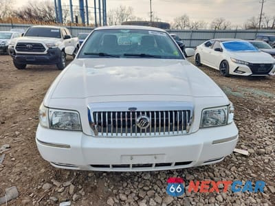 Piąte zdjęcie samochodu w środku: 2011 MERCURY GRAND MARQUIS LS VIN:2MEBM7FV8BX600079 - miniatura
