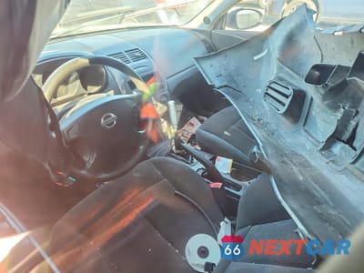 Zdjęcie 8 z 13 samochodu: 2002 NISSAN ALTIMA AUTOMATIC VIN:1N4AL11E32C209526 - miniatura