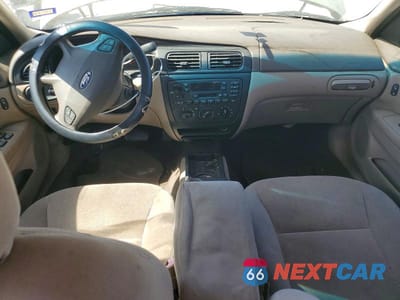 Zdjęcie 8 z 13 samochodu: 2000 FORD TAURUS SE VIN:1FAFP5325YA255920 - miniatura