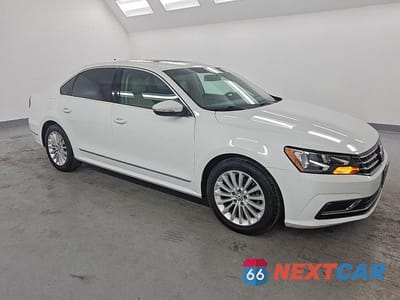 Czwarte zdjęcie samochodu z boku: 2016 VOLKSWAGEN PASSAT SE VIN:1VWBT7A38GC010945 - miniatura