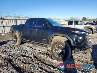 Czwarte zdjęcie samochodu z boku: 2024 GMC CANYON AT4 VIN:1GTP6DEKXR1192968 - miniatura