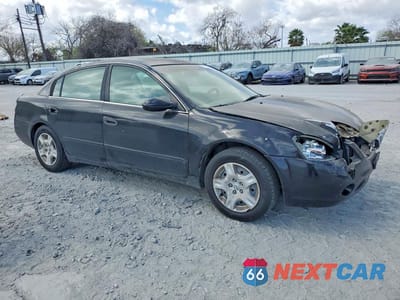 Czwarte zdjęcie samochodu z boku: 2002 NISSAN ALTIMA 2.5 VIN:1N4AL11D52C192977 - miniatura