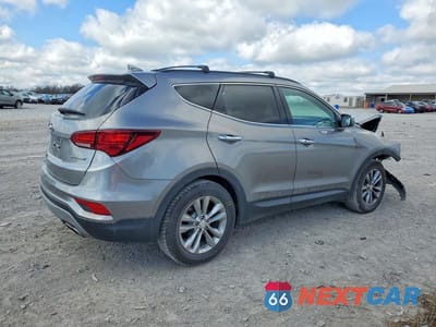 Trzecie zdjęcie samochodu z tyłu: 2018 HYUNDAI SANTA FE SPORT 2.0T VIN:5NMZU4LA2JH105826 - miniatura