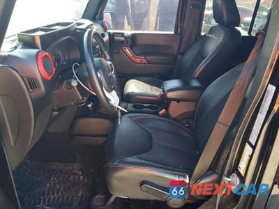 Zdjęcie 7 z 11 samochodu: 2015 JEEP WRANGLER UNLIMITED SAHARA VIN:1C4BJWEG2FL623268 - miniatura