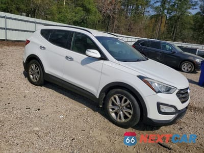 Czwarte zdjęcie samochodu z boku: 2014 HYUNDAI SANTA FE SPORT 2.0T VIN:5XYZUDLA5EG133121 - miniatura