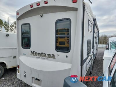Czwarte zdjęcie samochodu z boku: 2011 KEYSTONE MONTANA CAMPER VIN:4YDF33327BA740607 - miniatura