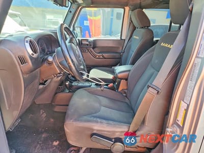 Zdjęcie 7 z 12 samochodu: 2015 JEEP WRANGLER UNLIMITED SAHARA VIN:1C4BJWEG9FL547435 - miniatura